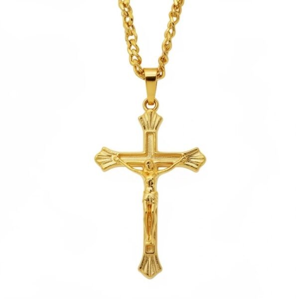 "Crocefisso Dorato Classico" A timeless symbol of faith and devotion. The Crocefisso Dorato Classico is designed for those who cherish both tradition and beauty. This gold-toned crucifix features intricate detailing and a radiant polished finish, capturing the sacred symbolism of the crucifix in an elegant, wearable form. Suspended from a 24-inch gold-toned curb chain, it offers durability, comfort, and a refined look that transitions seamlessly from daily wear to special occasions. A meaningful gift of devotion, strength, and grace.