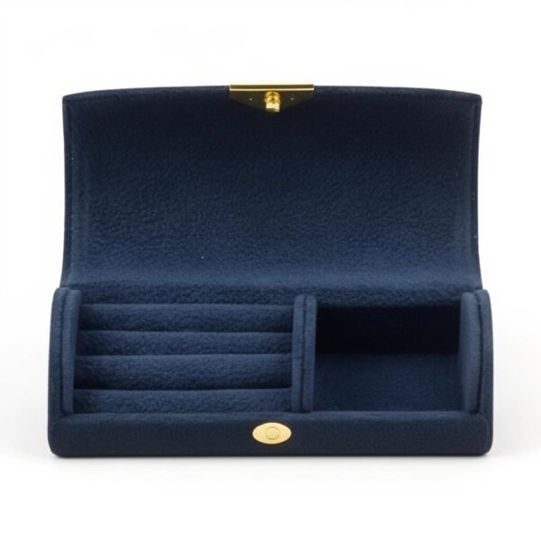 "Velluto Reale"  Where luxury keeps your treasures safe.  Elevate your jewelry storage with the Velluto Reale Jewelry Organzier, a petite organizer wrapped in plush velvet for a touch of regal Italian elegance. Designed in a compact, travel-friendly size, it keeps your rings, earrings, bracelets, and keepsakes beautifully protected and perfectly organized. Its structured interior, soft velvet lining, and secure zipper closure make it ideal for slipping into a purse, luggage, or bedside drawer. Whether for travel or everyday storage, Velluto Reale brings together practicality, beauty, and timeless Bella Pia charm. Dimensions: 3.94" × 1.97" × 1.38" Features: Multiple compartments for rings, earrings, and small jewelry