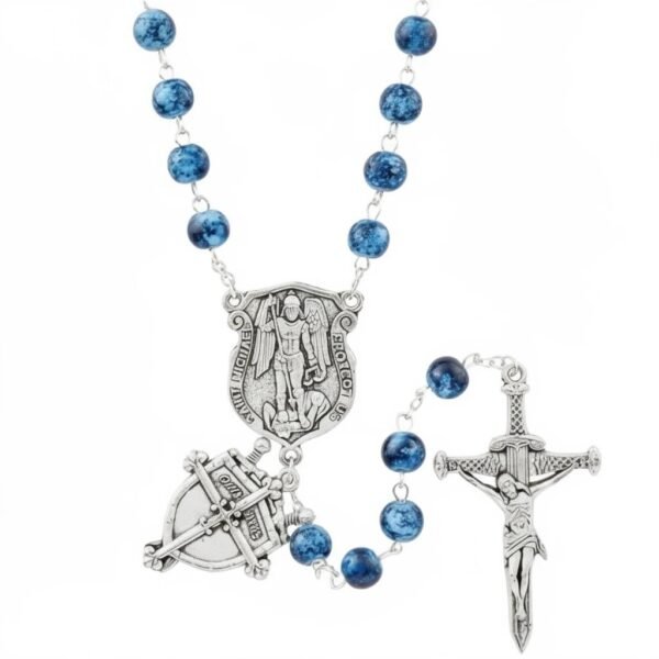 "Rosario di San Michele Azzure" Your heavenly shield, carried daily. Inspired by the timeless devotion to the Archangel Michael, the Rosario di San Michele Azzurro rosary blends Italian elegance with deep spiritual meaning. Each blue marbled bead offers a calming rhythm to prayer, while the intricately sculpted St. Michael medallion honors Heaven’s fiercest protector. The ornate crucifix completes this heirloom-style piece, making it both a devotional treasure and a beautiful keepsake. Carry it as a reminder that courage surrounds you, protection walks with you, and faith is always within reach. Perfect for men, women, and teens seeking a strong, traditional, and beautifully crafted rosary.