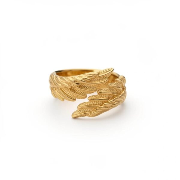 "Ali di Grazia" A symbol of protection, guidance, and divine grace. The Ali di Grazia Ring is a graceful expression of faith and symbolism. Designed with an open silhouette, this piece showcases beautifully sculpted angel wings, representing protection, guidance, and divine presence through every season of life. Finished in radiant gold plating, the ring is adjustable, and perfect for everyday wear or thoughtful gifting. Whether worn alone or paired with coordinating Bella Pia pieces, Ali di Grazia carries meaning as beautifully as it shines.