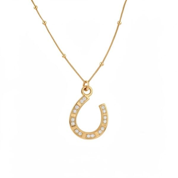 "Fortuna" Where luck meets elegance. The Fortuna Necklace is a radiant symbol of luck, protection, and refined beauty. Crafted in luminous gold plating, this elegant horseshoe pendant is accented with shimmering crystals that trace its graceful curve, catching the light with every movement. Long regarded as a talisman of good fortune, the horseshoe represents prosperity, strength, and blessings yet to come. Reimagined with modern elegance, Fortuna is designed to be worn close to the heart, perfect on its own or layered with other Bella Pia favorites. A timeless piece that brings meaning, confidence, and a touch of everyday magic to any look.