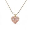 "Cuore Rosa" Love, softly illuminated. The Cuore Rosa Mosaic Necklace is a radiant expression of love and feminine elegance. Crafted in luminous gold plating, this heart-shaped pendant features a delicate mosaic of soft blush pink and iridescent mother-of-pearl tiles, creating a gentle interplay of color and light. Each piece reflects subtle variations, giving the necklace a handcrafted feel that feels both timeless and modern. The glowing heart silhouette symbolizes love, warmth, and emotional connection—designed to be worn close to the heart. Perfect worn alone as a romantic statement or layered with other Bella Pia favorites, the Cuore Rosa Mosaic Necklace transitions effortlessly from everyday moments to special occasions. A meaningful keepsake or thoughtful gift, it captures love in its most luminous form.