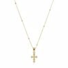 "Croce Aurea Necklace" Faith, refined in gold. The Croce Aurea Necklace is a timeless expression of faith and understated elegance. Crafted in radiant gold plating, this delicate cross pendant features softly rounded bead detailing, creating a gentle, luminous glow with every movement. Suspended from a slender gold-plated chain accented with subtle stations, the design feels light, graceful, and effortlessly wearable. Its minimalist silhouette allows the symbolism of the cross to shine—making it a meaningful piece for everyday devotion or a thoughtful, faith-filled gift. Designed to be worn alone or layered with other Bella Pia favorites, the Croce Aurea Necklace is a beautiful reminder that faith can be both powerful and elegantly simple.