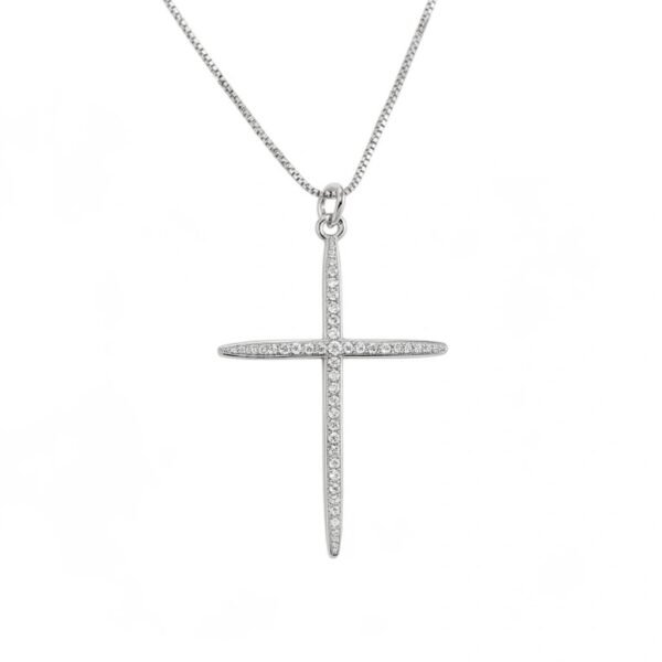 "Fede di Luce" Strength in faith, brilliance in light. The Fede di Luce Necklace is a timeless emblem of devotion and quiet strength. Crafted in a sleek silver-plated finish, this elegant cross is adorned with shimmering crystal accents that reflect light with refined brilliance. Each stone is thoughtfully set to enhance the slender silhouette, creating a design that feels both modern and reverent. The luminous crystals symbolize clarity, hope, and spiritual guidance, while the clean lines of the cross offer a graceful, contemporary expression of faith. Perfect for everyday wear or as a meaningful gift, the Fede di Luce Necklace is a beautiful reminder that faith can be both powerful and softly radiant—meant to be worn close to the heart.