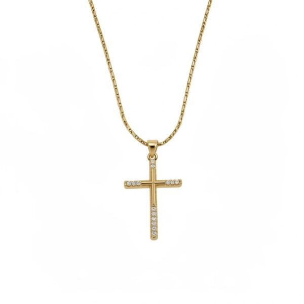 "Croce di Grazia" Faith, framed in light. The Croce di Grazia Necklace is a graceful expression of faith and modern elegance. Crafted in radiant gold plating, this refined cross pendant features delicate crystal accents set along its arms, creating a subtle shimmer that catches the light with every movement. The clean lines and balanced proportions give this piece a timeless silhouette, blending spiritual meaning with contemporary design. Thoughtfully detailed yet understated, it is perfect for everyday wear while remaining elegant enough for meaningful occasions. Designed to be worn close to the heart, the Croce di Grazia Necklace serves as a beautiful reminder of grace, devotion, and inner strength, making it a cherished keepsake or a thoughtful gift of faith.